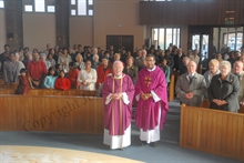 Father Harrington & Father Karippai with the congregation at St Patrick's church, Walsall